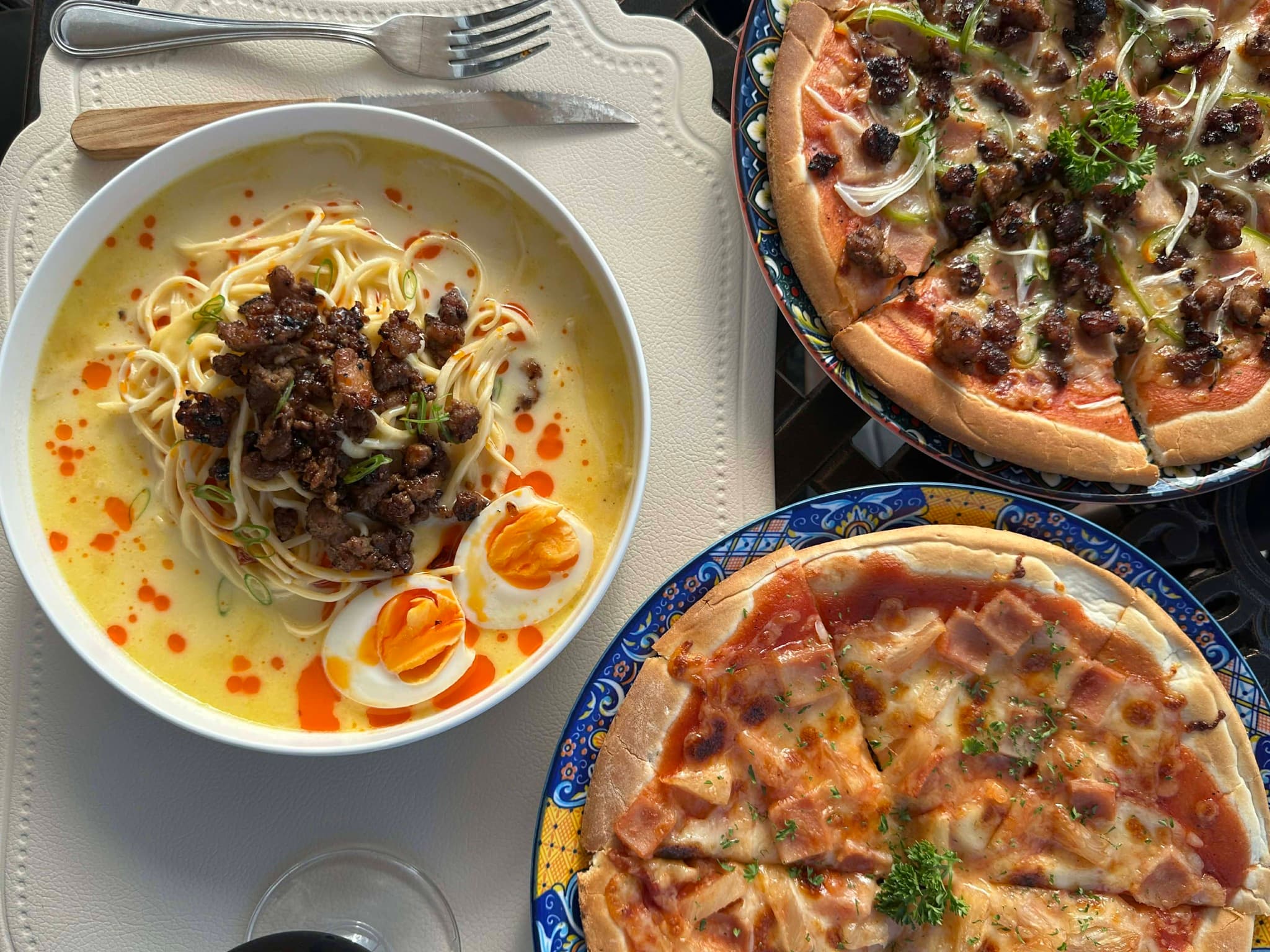 Ramen and pizza spread at Merry Plates Restaurant inside Highlights Taal Lakeview Resort Batangas